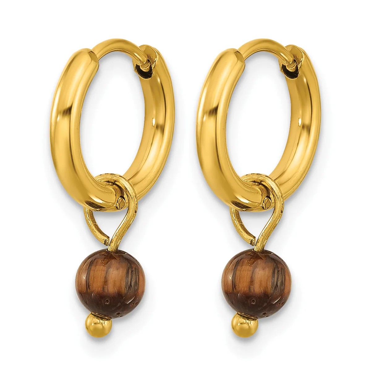 A pair of gold hoop earrings with polished oval loops and brown wooden ball charms suspended from small gold connectors.