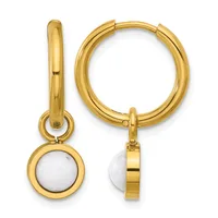 Pair of gold-toned hoop earrings with white stone charm drops attached to the hinged closures.
