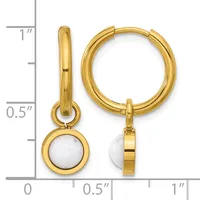 Gold-tone hoop earrings with dangling white pearl charms, displayed next to a measurement ruler showing approximately one inch in length.