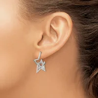A silver star-shaped earring with diamond accents hanging from a post, worn on a person's earlobe.