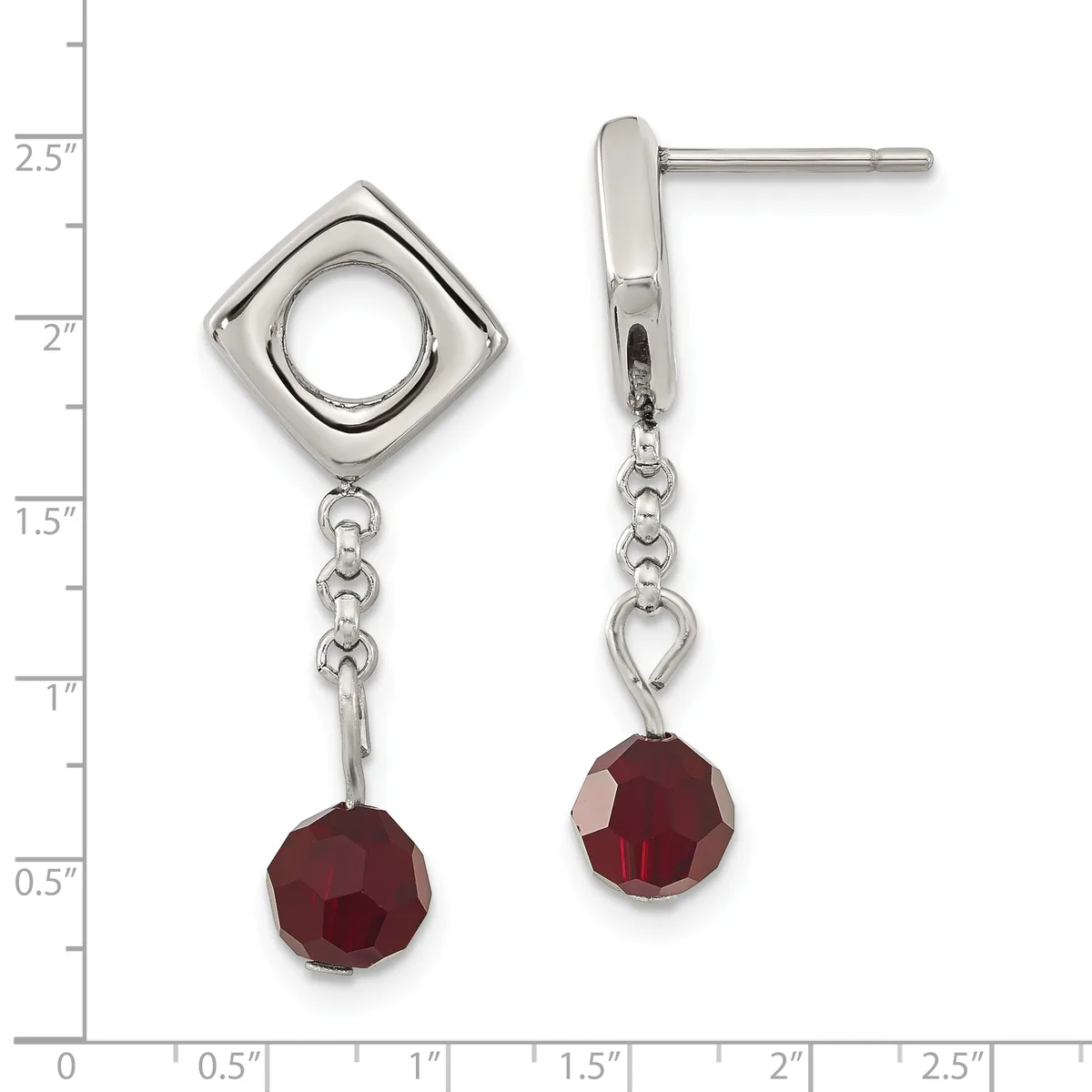 Pair of silver-toned drop earrings with square frames, chain links, and faceted red gemstone beads, shown against a measurement scale.