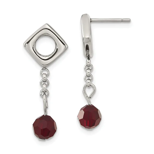 Pair of silver dangle earrings with square tops featuring circular cutouts, chain links, and faceted red gemstone drops.