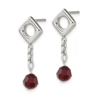Pair of silver drop earrings with square frames featuring oval cutouts, chain links, and faceted red gemstone drops.