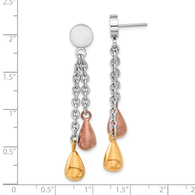Two-tone teardrop earrings with silver posts and chains, featuring rose gold and gold-plated drop charms, displayed against a measurement scale.