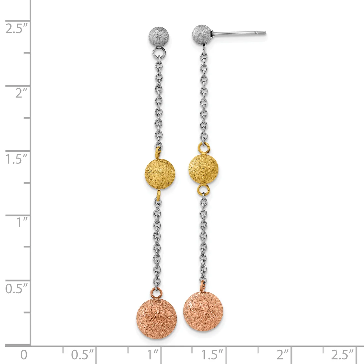 Pair of drop earrings with textured gold spheres suspended above larger textured rose gold spheres, connected by silver-toned chain links, displayed against a measurement scale.