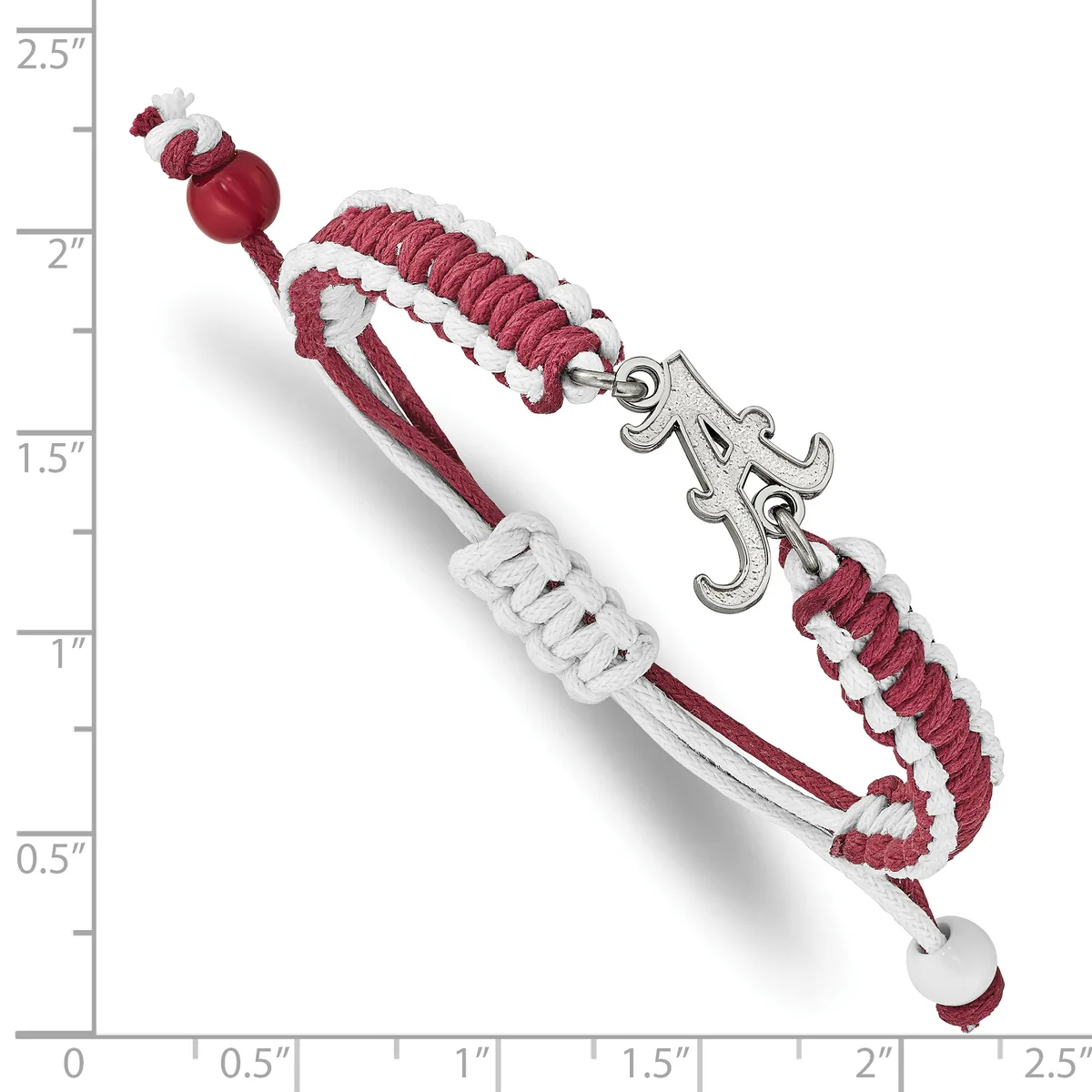 A burgundy and white braided cord bracelet with a silver fleur-de-lis charm, displayed against a measurement scale showing approximately 2.5 inches in length.
