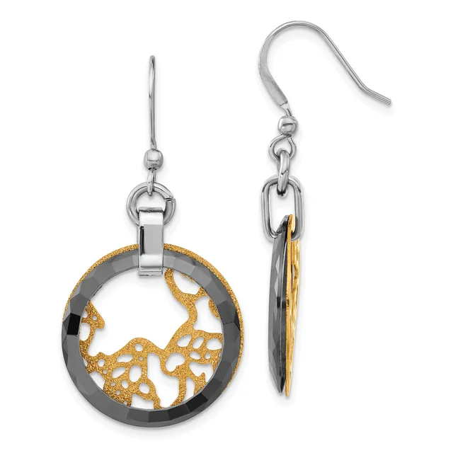 Pair of two-tone drop earrings with silver ear wires featuring circular charms with gold-colored cutout designs and silver bezels.