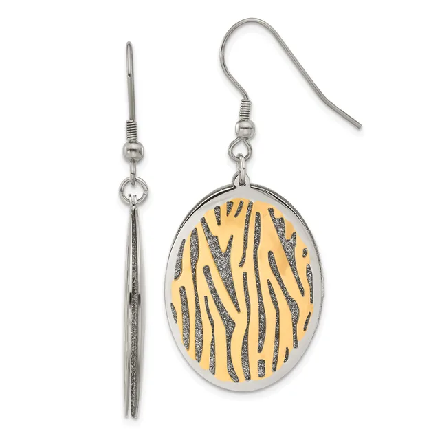 A pair of silver earrings with matching oval pendants featuring a zebra stripe pattern in gold and white enamel, displayed against a white background.