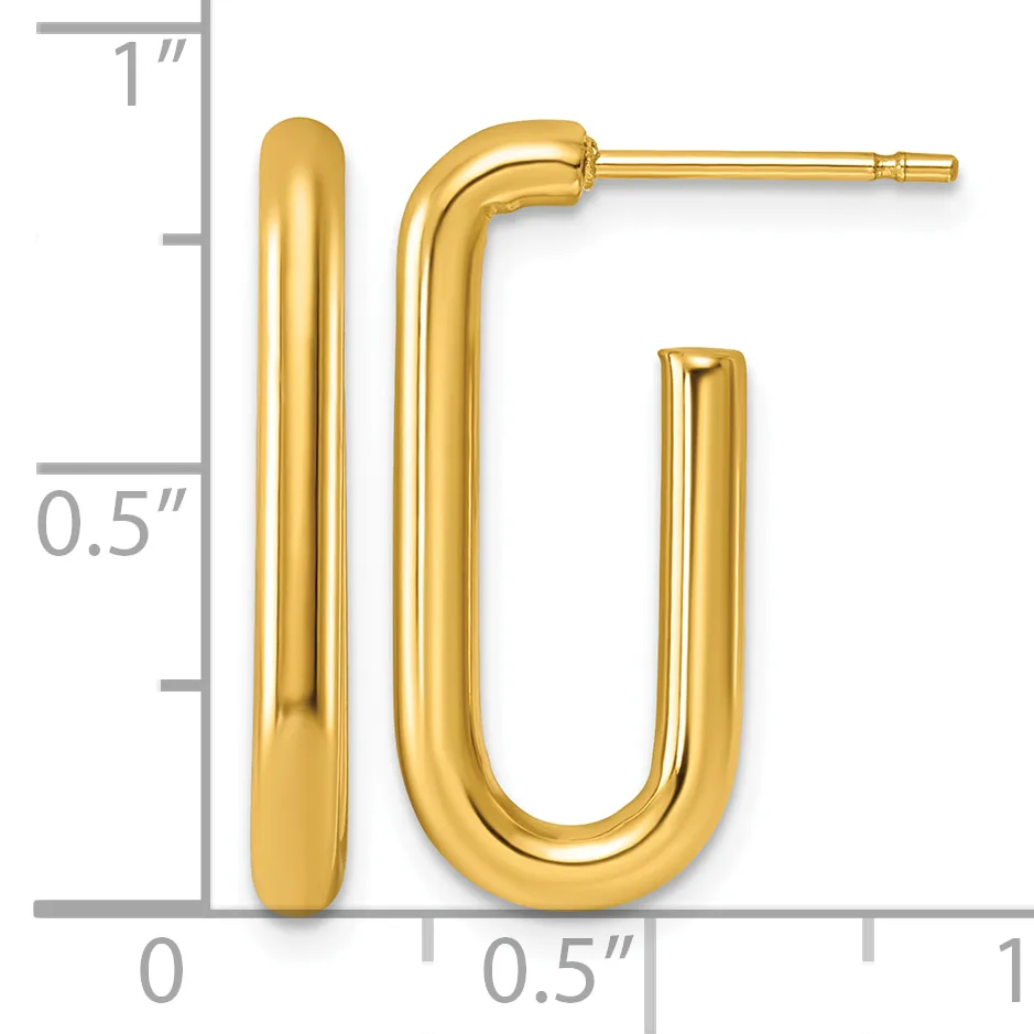 A pair of polished gold tubular hoop earrings with rounded ends, displayed against a ruler showing measurements up to one inch.