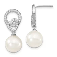 Pair of silver drop earrings with cubic zirconia-studded teardrop tops and round white pearl pendants, shown from front and side angles.