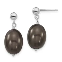 A pair of silver stud earrings with polished ball tops and oval dark brown pearl pendants hanging from short chains.