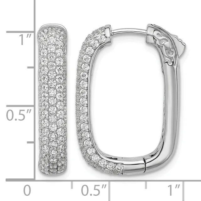 Pair of white metal hoop earrings densely covered with round diamonds, shown open and closed with a measurement scale indicating approximately one inch in length.
