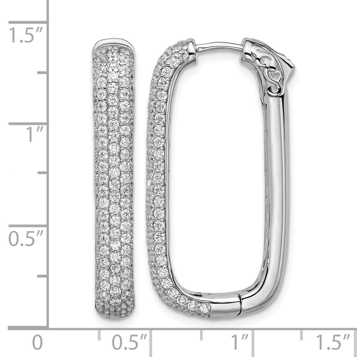 Pair of white metal hoop earrings densely paved with small round diamonds, displayed open and closed against a measurement scale showing approximately 1.25 inches in length.