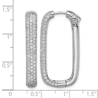 Pair of white metal hoop earrings densely paved with small round diamonds, displayed open and closed against a measurement scale showing approximately 1.25 inches in length.