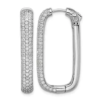 A pair of silver hoop earrings densely paved with round diamonds, shown from the front and side angles, with hinged closures at the top.