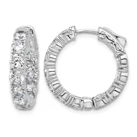 A pair of silver hoop earrings with a hinged clasp, densely set with round cubic zirconia stones on both the front and back surfaces.