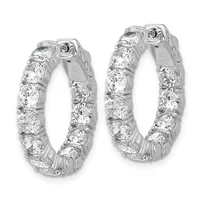A pair of silver hoop earrings set with multiple round cubic zirconia stones arranged in a continuous line around each hoop, shown against a white background.