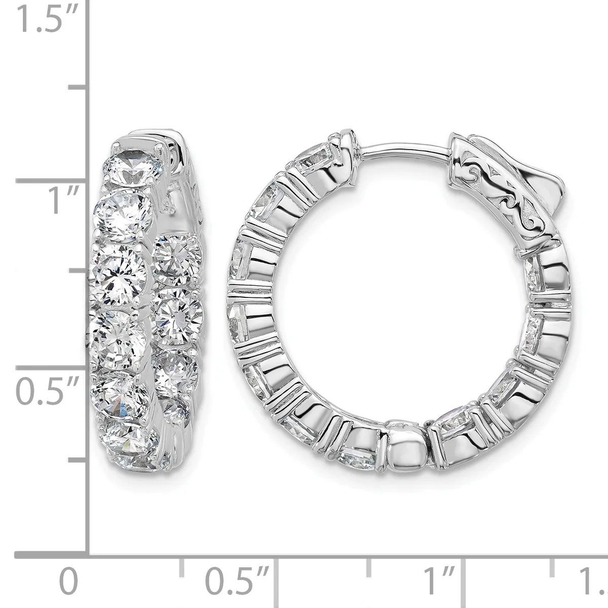 A pair of silver hoop earrings set with round diamonds, displayed next to a ruler showing their approximate 1-inch diameter size.