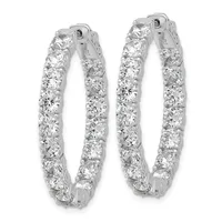 Pair of silver hoop earrings densely set with round diamonds throughout, shown from the front against a white background.