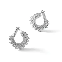 A pair of silver teardrop-shaped hoop earrings with diamond-shaped stone settings arranged around the outer edges, shown from two angles.