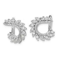 A pair of silver hoop earrings with leaf-shaped diamond settings arranged in a cascading pattern around the outer edges, shown from the front against a white background.