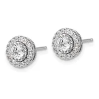 A pair of round diamond stud earrings with a central round diamond surrounded by a halo of smaller diamonds in white metal, shown from the front.