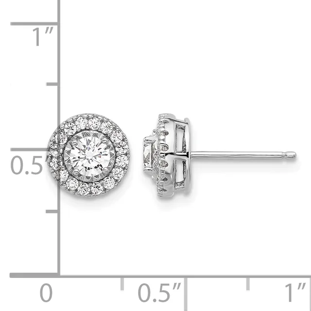 A pair of diamond stud earrings with round brilliant-cut center stones surrounded by halos of smaller diamonds, shown against a measurement scale.