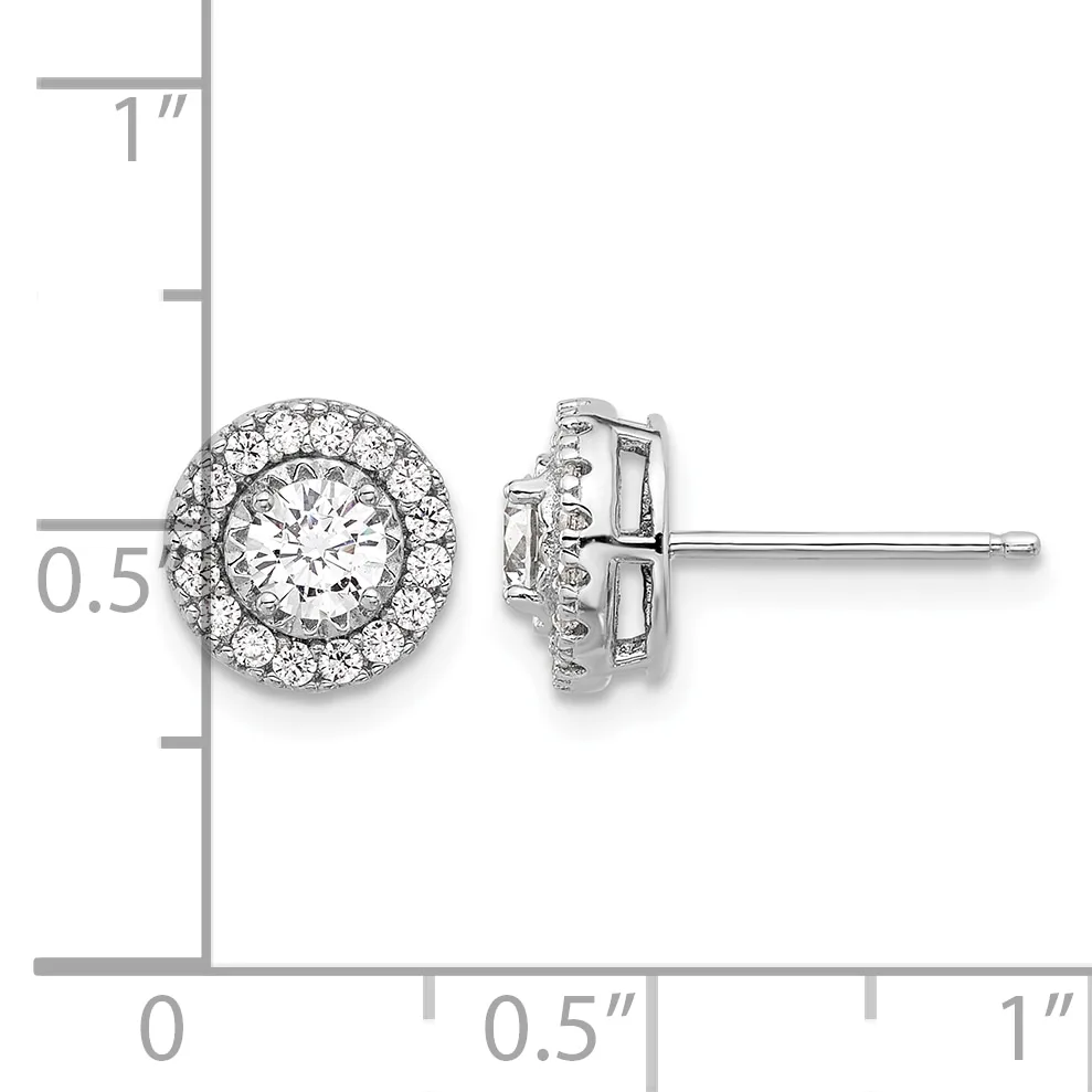 A pair of diamond stud earrings with round brilliant-cut center stones surrounded by halos of smaller diamonds, shown against a measurement scale.