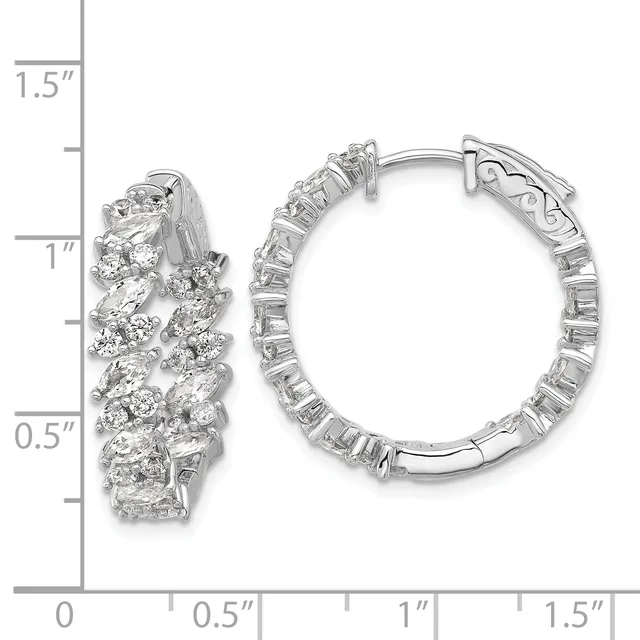 A pair of silver hoop earrings with clustered round and marquise-cut cubic zirconia stones, shown against a measurement scale indicating approximately one inch in height.