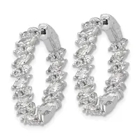 Pair of white metal hoop earrings with alternating oval and round diamonds set in a clustered pattern, shown from two angles.
