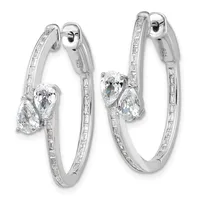 Pair of silver hoop earrings with channel-set baguette diamonds along the outer edges and pear-shaped diamond drops, shown from front and side angles.