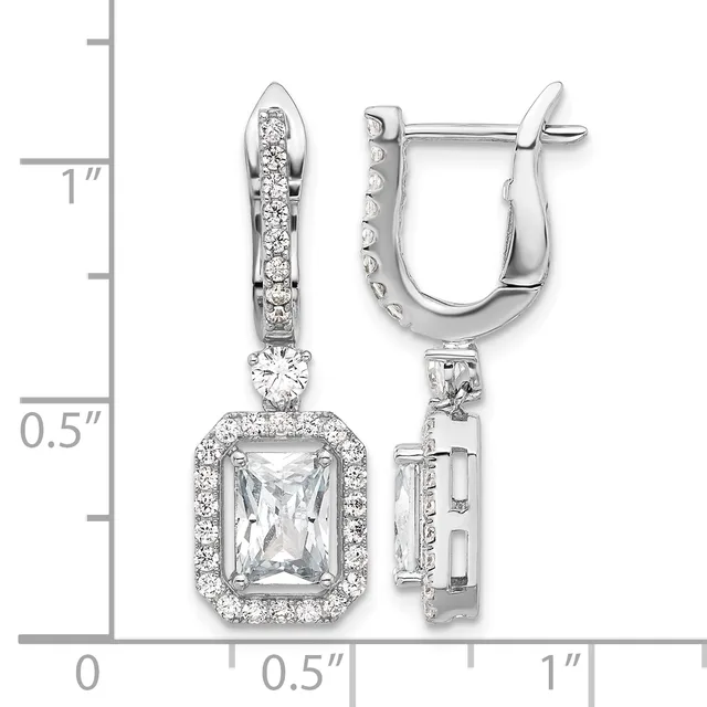 Silver-toned dangle earrings with rectangular faceted crystals surrounded by smaller round crystals, shown next to a measurement scale indicating approximately one inch in length.