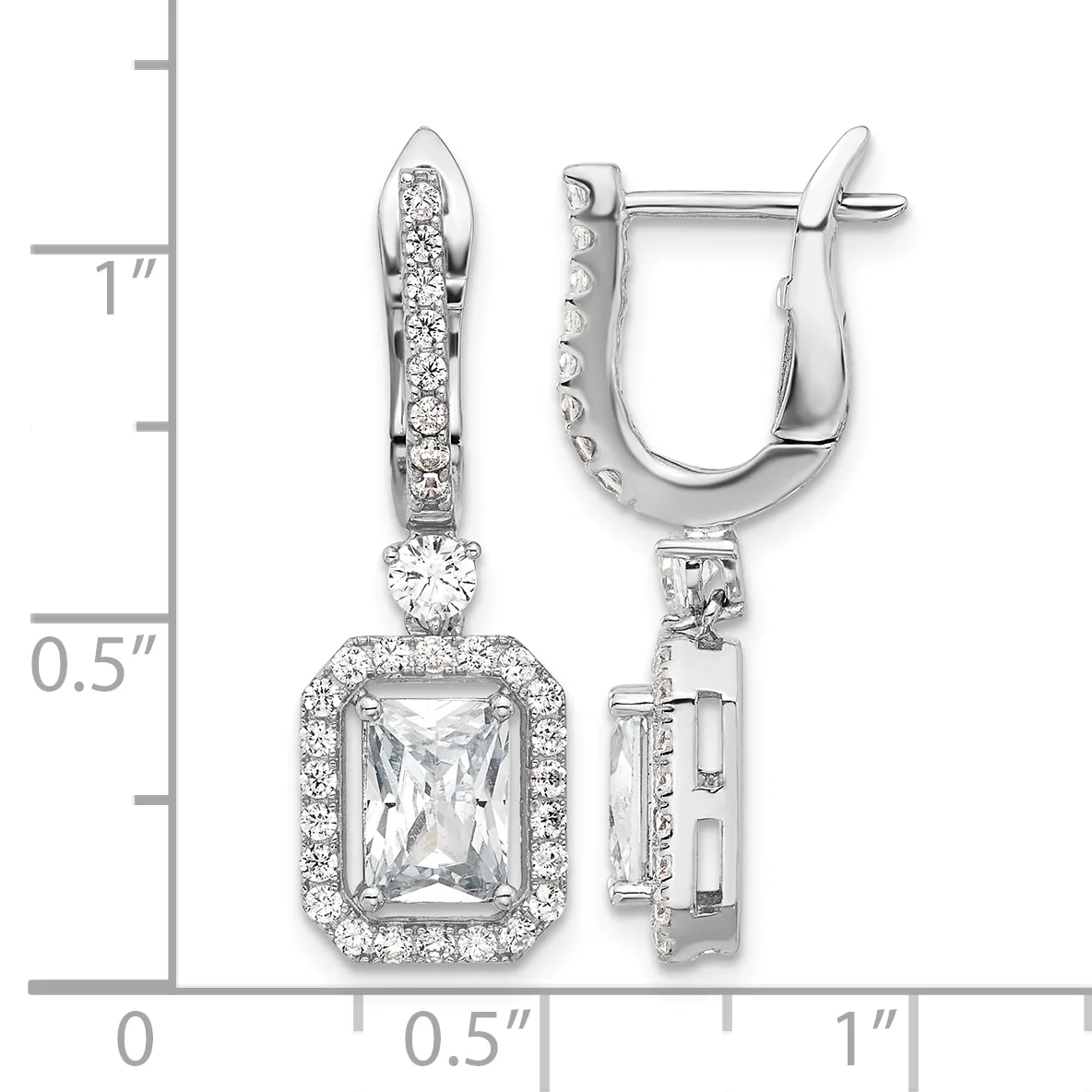 Silver-toned dangle earrings with rectangular faceted crystals surrounded by smaller round crystals, shown next to a measurement scale indicating approximately one inch in length.