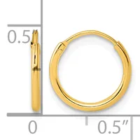 A pair of polished gold hoop earrings with a hinged post closure, displayed against a measurement scale showing dimensions of approximately 0.5 inches.