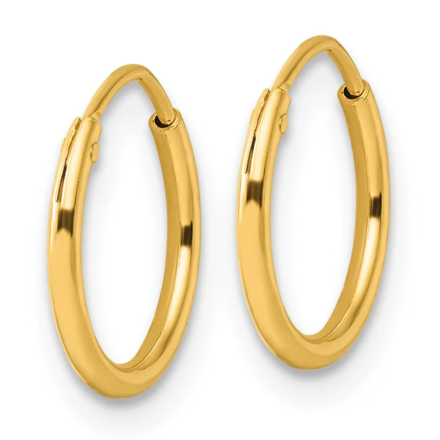 A pair of polished gold hoop earrings with a smooth, rounded tubular design and hinged closures, displayed against a white background.