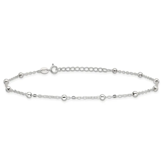 A silver beaded bracelet with small spherical beads spaced along a delicate chain, featuring an adjustable length with a clasp and extension chain.
