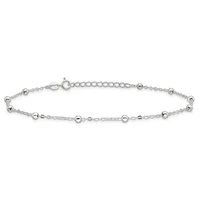 A silver beaded bracelet with small spherical beads spaced along a delicate chain, featuring an adjustable length with a clasp and extension chain.