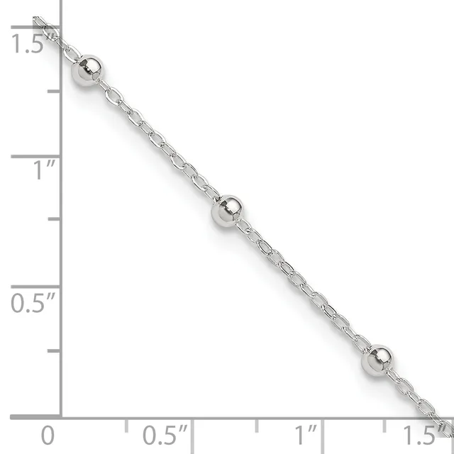 Silver-toned chain bracelet with three evenly spaced polished spherical beads, displayed against a ruler showing approximately 1.5 inches in length.