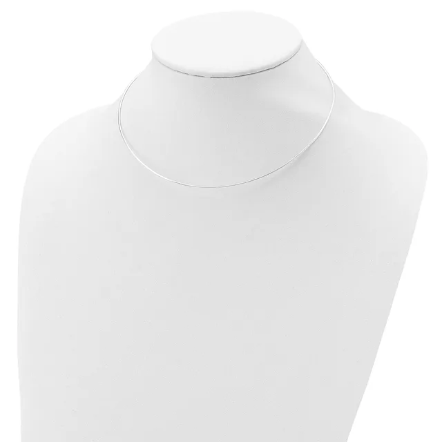 A delicate silver-toned choker necklace displayed on a white mannequin bust.