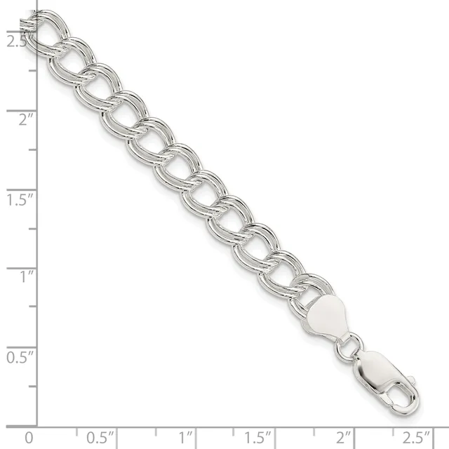 Silver-toned chain bracelet with interlocking oval links and a lobster claw clasp, displayed against a ruler showing approximately 2.5 inches in length.
