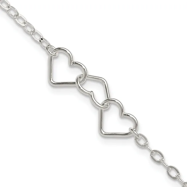 Silver-toned bracelet with two connected open heart charms hanging from a delicate chain link band.