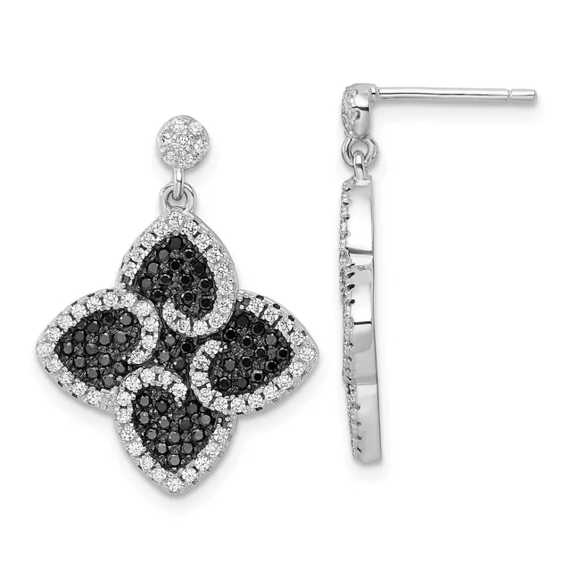 Pair of dangling earrings featuring four-lobed clover shapes with black diamonds surrounded by white diamonds in silver, shown from front and side views.