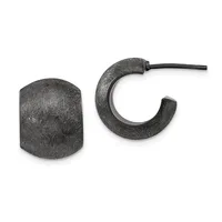 A pair of dark textured metal hoop earrings, one shown as a chunky cylinder and the other as a curved C-shape with a post.