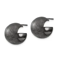 Pair of textured blackened metal crescent-shaped hoop earrings with polished curved insets and post-back closures.