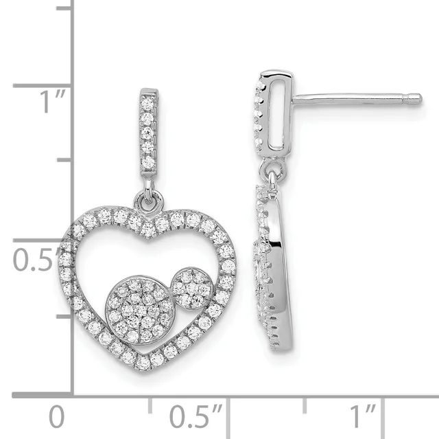 Silver heart-shaped dangle earrings with diamond pavé setting and matching post backs, displayed against a ruler showing approximately one inch in length.