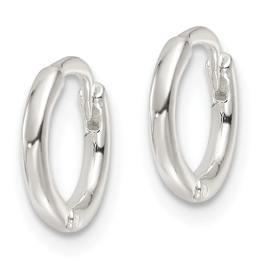 A pair of polished silver chunky hoop earrings with a smooth, rounded profile and hinged closures.