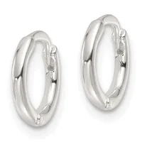 A pair of polished silver chunky hoop earrings with a smooth, rounded profile and hinged closures.