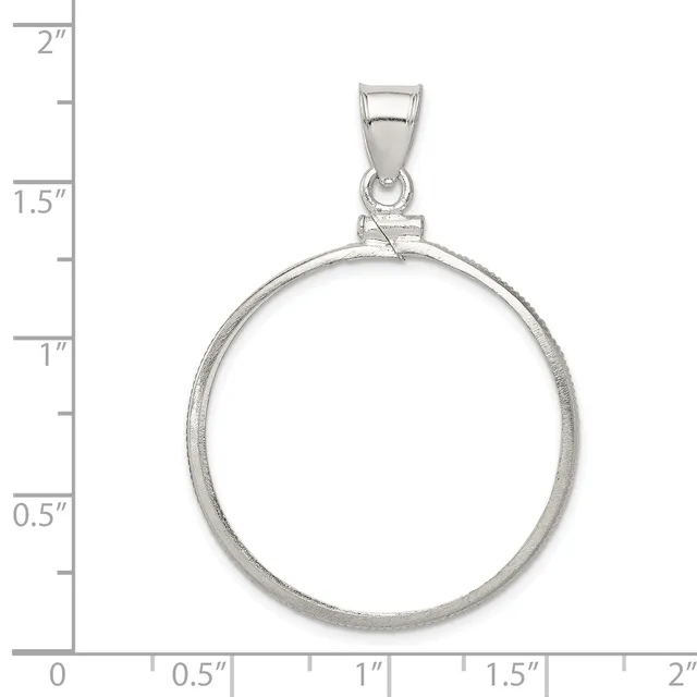 Sterling silver coin bezel pendant with loop bail, shown next to ruler measuring approximately 1.5 inches in diameter.