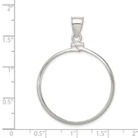Sterling silver coin bezel pendant with loop bail, shown next to ruler measuring approximately 1.5 inches in diameter.