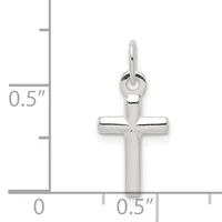 A polished silver cross pendant with rounded edges shown next to a ruler indicating its size is approximately half an inch wide and tall.